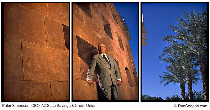 Peter Simonsen, CEO, AZ State Savings & Credit Union, standing in front of amazing walll