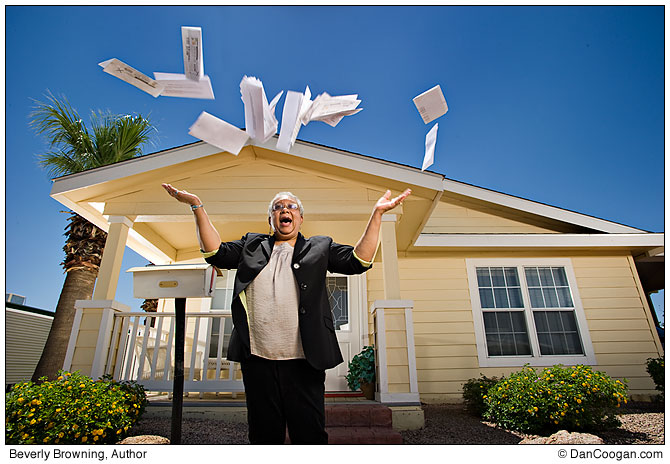 Beverly A. Browning, Author, of Mesa, AZ throwing her medical bills in the air for Black Enterprise Magazine, photo by Dan Coogan Portrait of Beverly A. Browning, Author, of Mesa, AZ throwing her medical bills in the air for Black Enterprise Magazine.