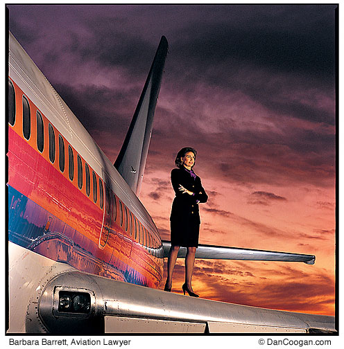 Barbara Barrett, Aviation Lawyer, standing on the wing of an airplane